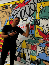 Putting the final touches on the new Gekko mural