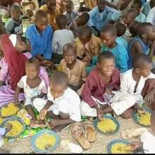 Picture while providing Meals relief orphans