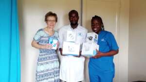 Dr & Clinical Officer receiving Omron donations.