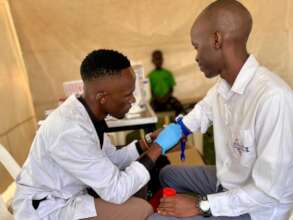 Taking blood samples for testing.