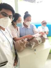 Lilian at a training with her colleagues