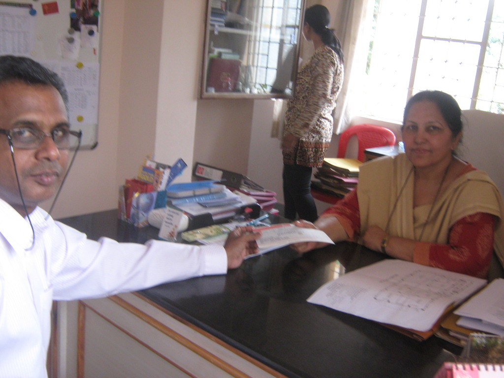 AfhVP gives check to Asha Kiran Special Needs Schl