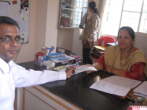 AfhVP gives check to Asha Kiran Special Needs Schl