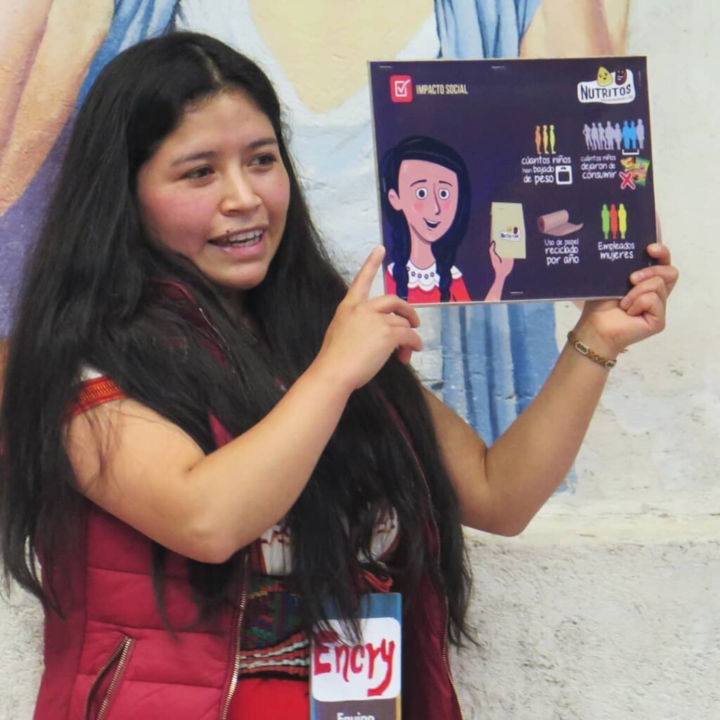 Team member giving a workshop on social impact