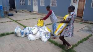 Sacks of maize flour arriving at Kimbilio