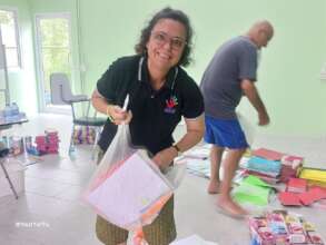 Packing 150 stationary packs for needy children.