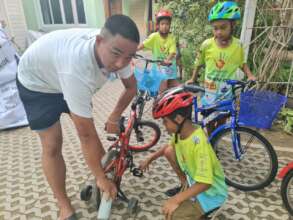 Teaching others how to care for the bike.