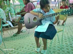 Learning the guitar.