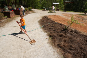 Jacob's Little Brother Helped Plant Flowers