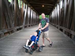 Kyle on a Covered Bridge with his Daddy