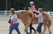 Give Equine Therapy to Children with Disabilities