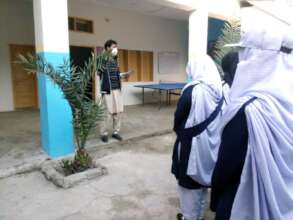 Voluntary director Fida Hussain addresses students