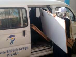 students offloading the whiteboards