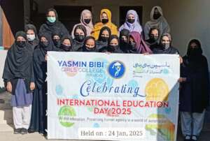 group photo of staff and students on education day