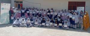 group photo of students with certificates