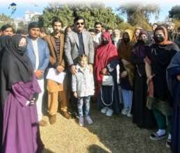 students and staff with Governor KP