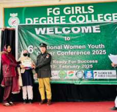 Student receiving award