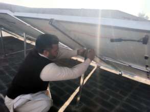 solar panel being fixed