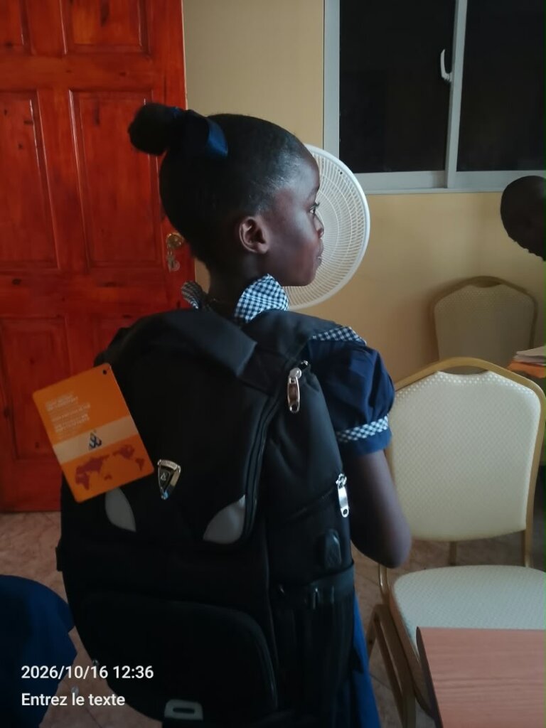 Student receiving school supplies