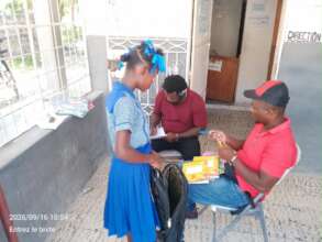 LFBS team visiting a family for back to school