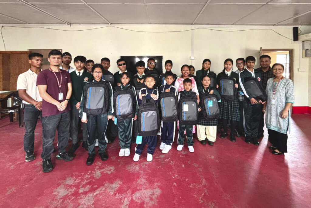 Students receiving laptops for digital learning