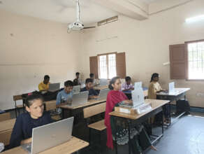 Students engaged in hands-on digital learning