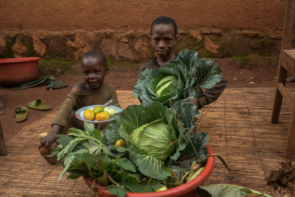 Farmer Nitunga's family with their harvest