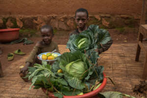 Farmer Nitunga's family with their harvest