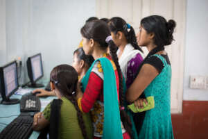Computer lesson at Apne Aap centre