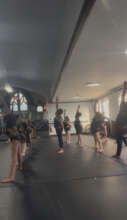 Leading youth dance class in studio