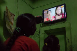 Girls from Bihar, India, watch TV series with SLS