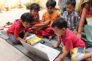 Village kids engaged with digital story
