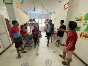 A house discussion takes place.