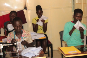 Embroidery lesson as part of tailoring training.