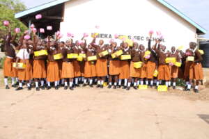 Girls in new uniforms and with sanitary pads