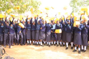 Happy students in new uniforms