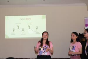 Three fellows present their hackathon project