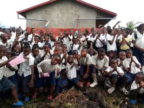 CV Kibati center children happy after class