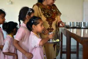 Queuing up for boiled eggs and milk