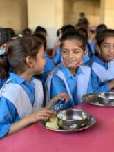 Students Sharing a Laugh Between Meals