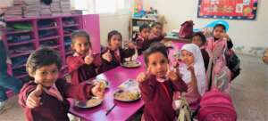 Students during a wholesome meal together.