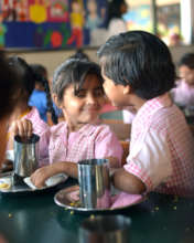 Breakfast for Kindergarten schoolgirls in Pakistan