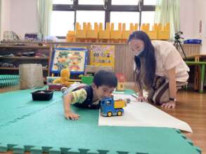 Toy car with play mat