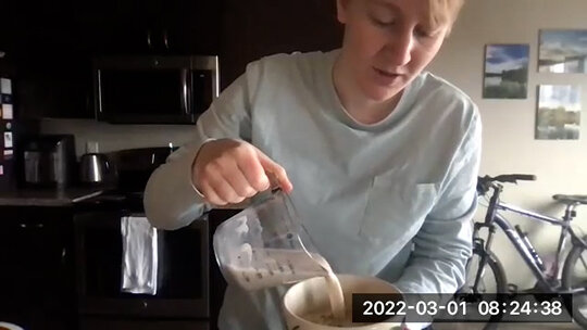 Add some almond milk to the oats.