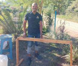 Babazi with the purpose built loom he created