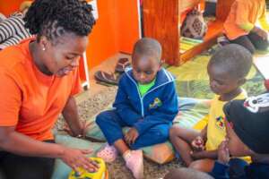 Melokuhle with classmates and teacher April 2024