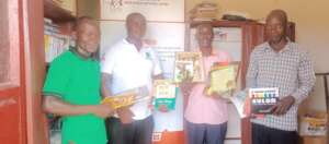 Teachers & Parents rep receiving books