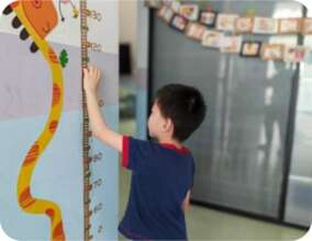 Xiaoji measures his height