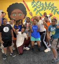 Kid Glyde with kids and trainers in the Bronx