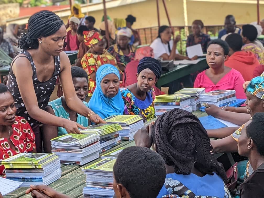 Distribution of school books to parents in Rwanda